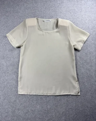 Blusa transparente con hombreras