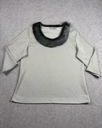 Blusa cuello pelo sintético
