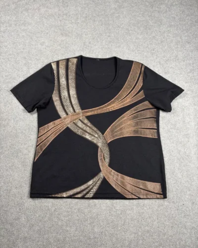 Remera lazos dorados